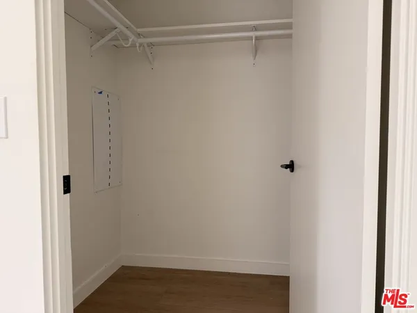 a view of an empty walk in closet