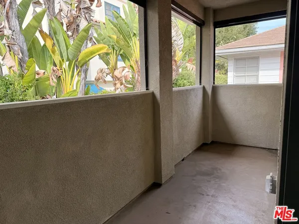 a view of a room that has a window