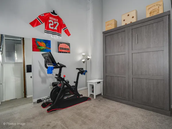 a view of balcony with seating space and barbeque oven