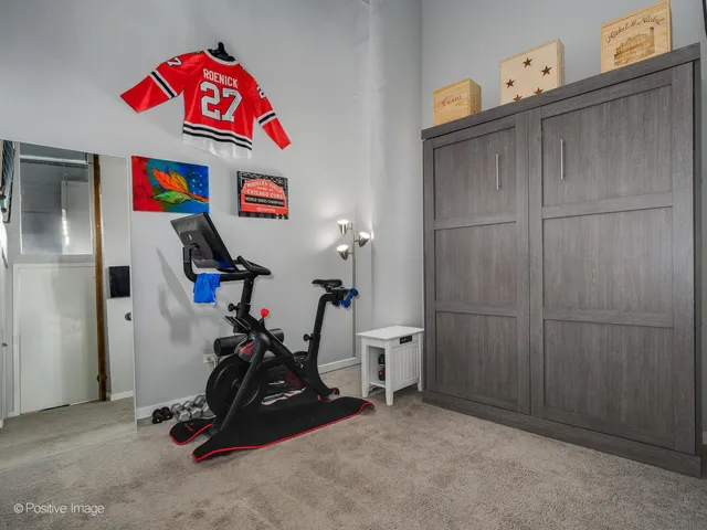 a view of balcony with seating space and barbeque oven