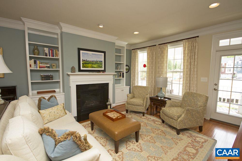 2016 Avinity Loop Charlottesville, VA 22902 - Photo 7 of 36 a living room with furniture and a fireplace