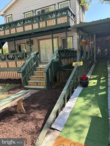 a view of an chairs and front door