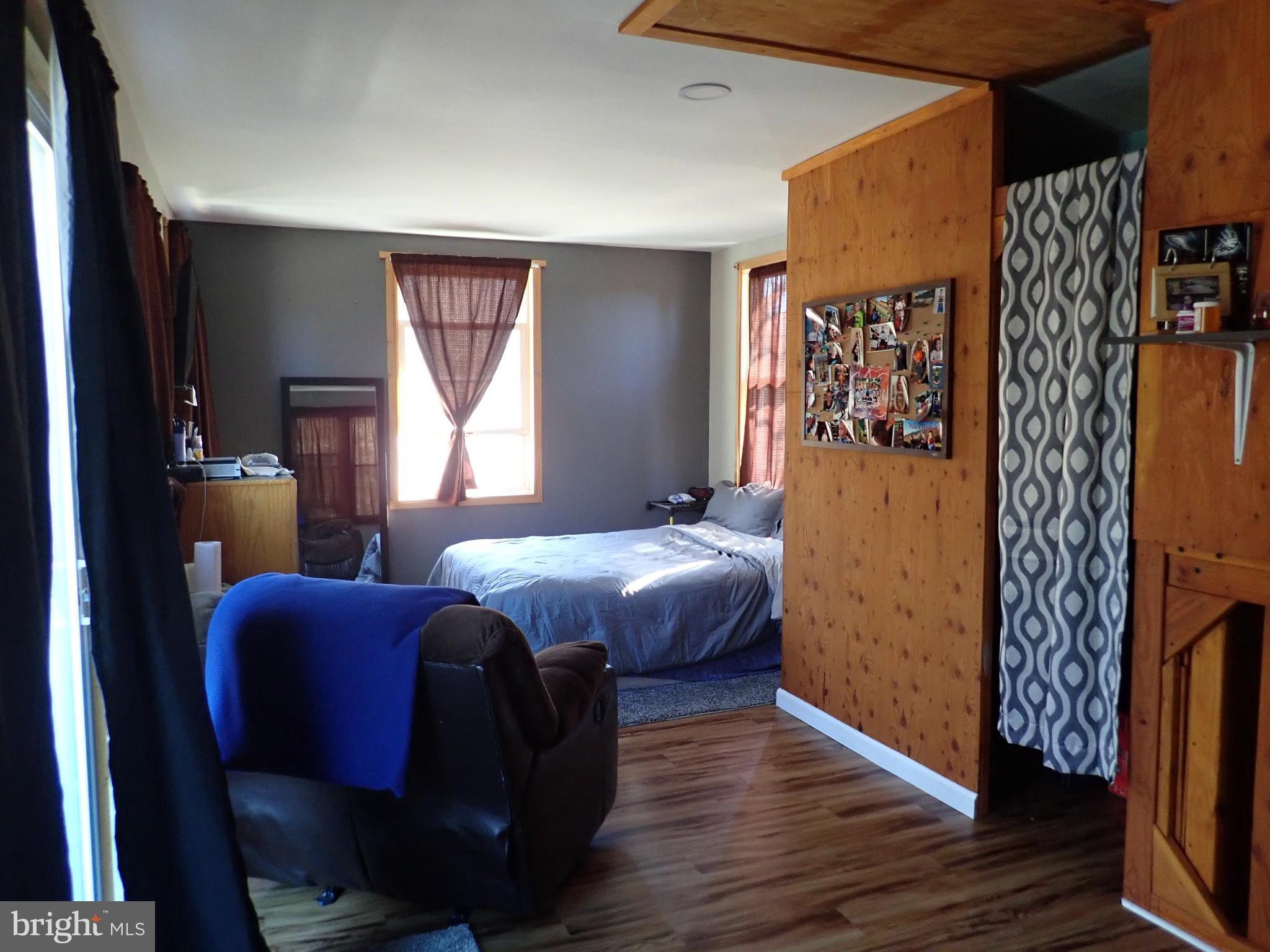 230 McKinneytown Road North East, MD 21901 - Photo 7 of 27 a bedroom with furniture and a window