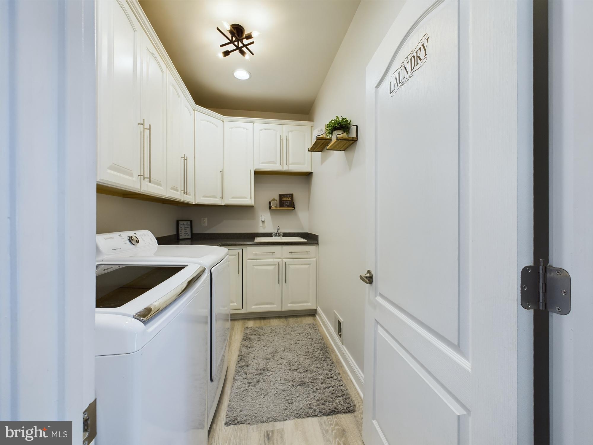14601 Driftwood Road Bowie, MD 20721 - Photo 12 of 90 Bright and functional laundry space.