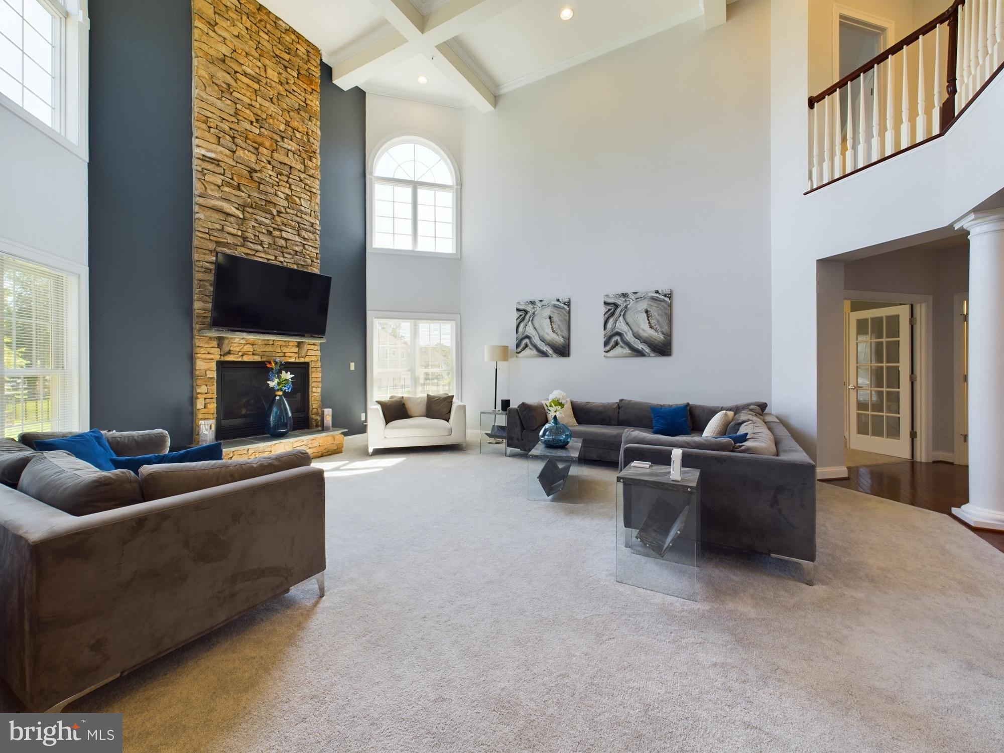 14601 Driftwood Road Bowie, MD 20721 - Photo 20 of 90 Spacious living room with elegant stone accents.