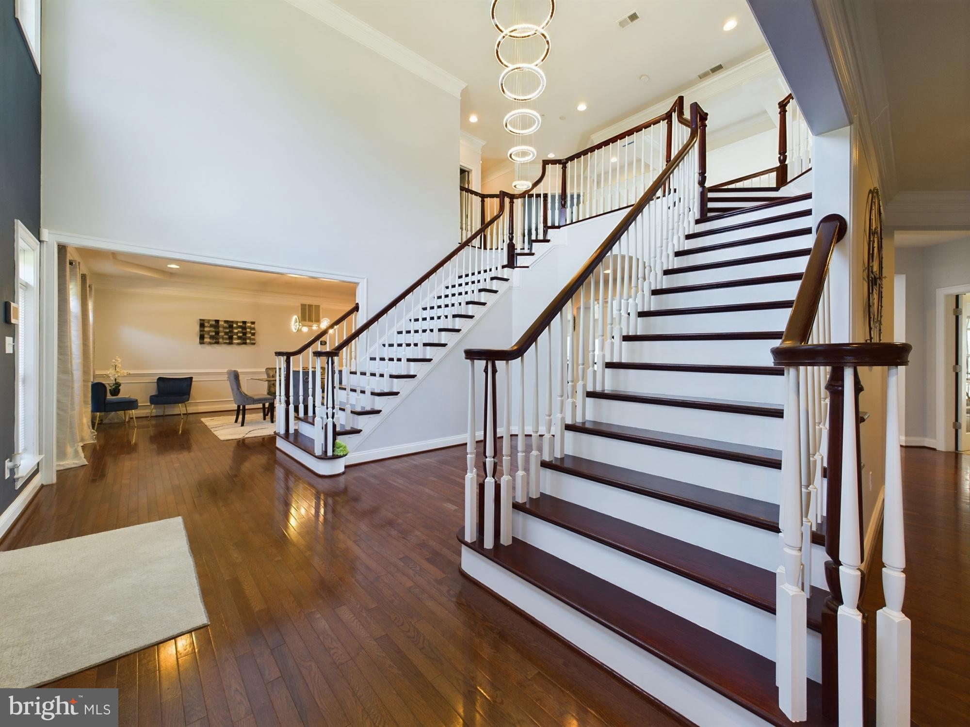 14601 Driftwood Road Bowie, MD 20721 - Photo 4 of 90 Elegant foyer with grand staircase allure.