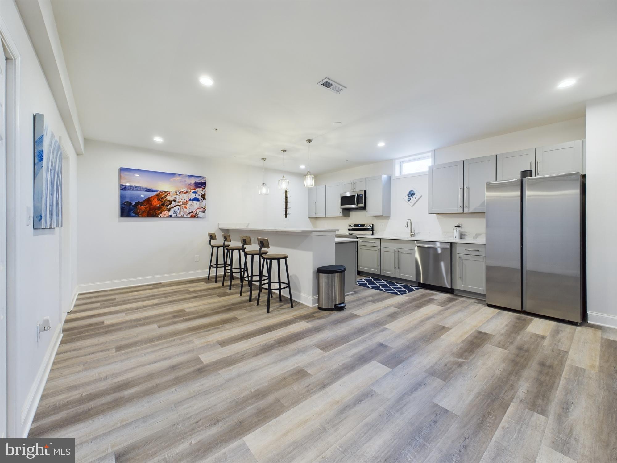14601 Driftwood Road Bowie, MD 20721 - Photo 43 of 90 Modern kitchen with sleek finishes and light.