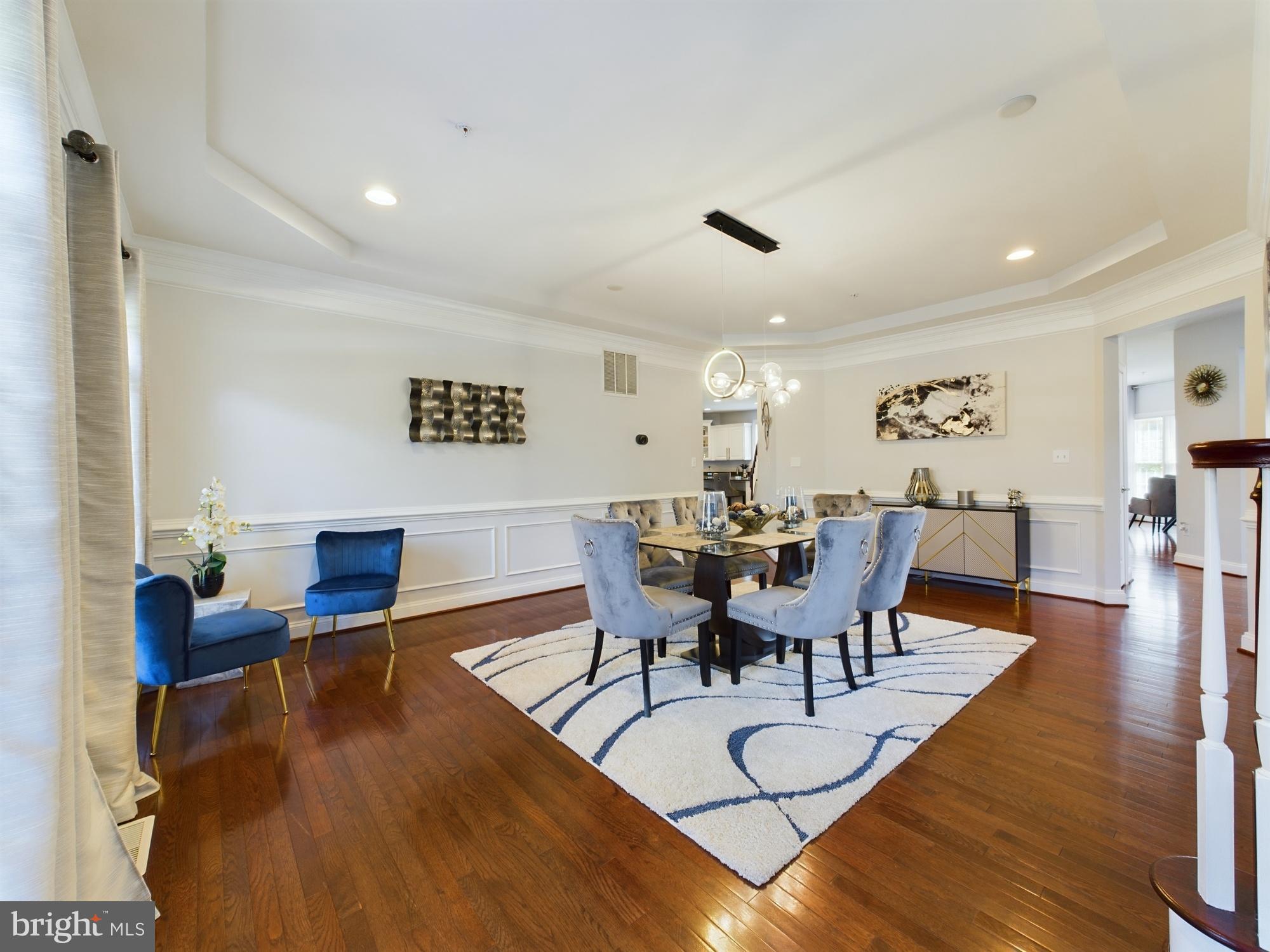 14601 Driftwood Road Bowie, MD 20721 - Photo 5 of 90 Elegant dining space with rich hardwood floors.
