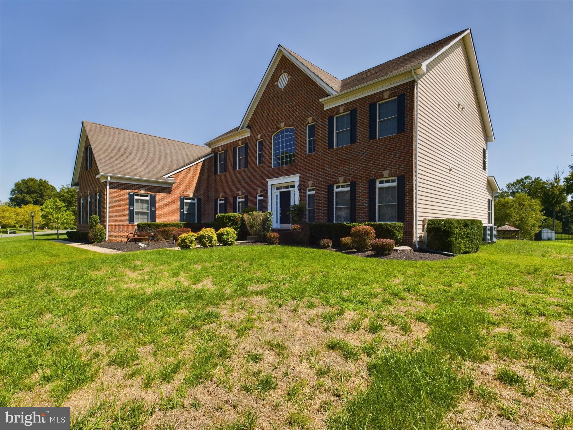 14601 Driftwood Road Bowie, MD 20721 - Photo 53 of 90 Elegant brick home with lush green lawn.