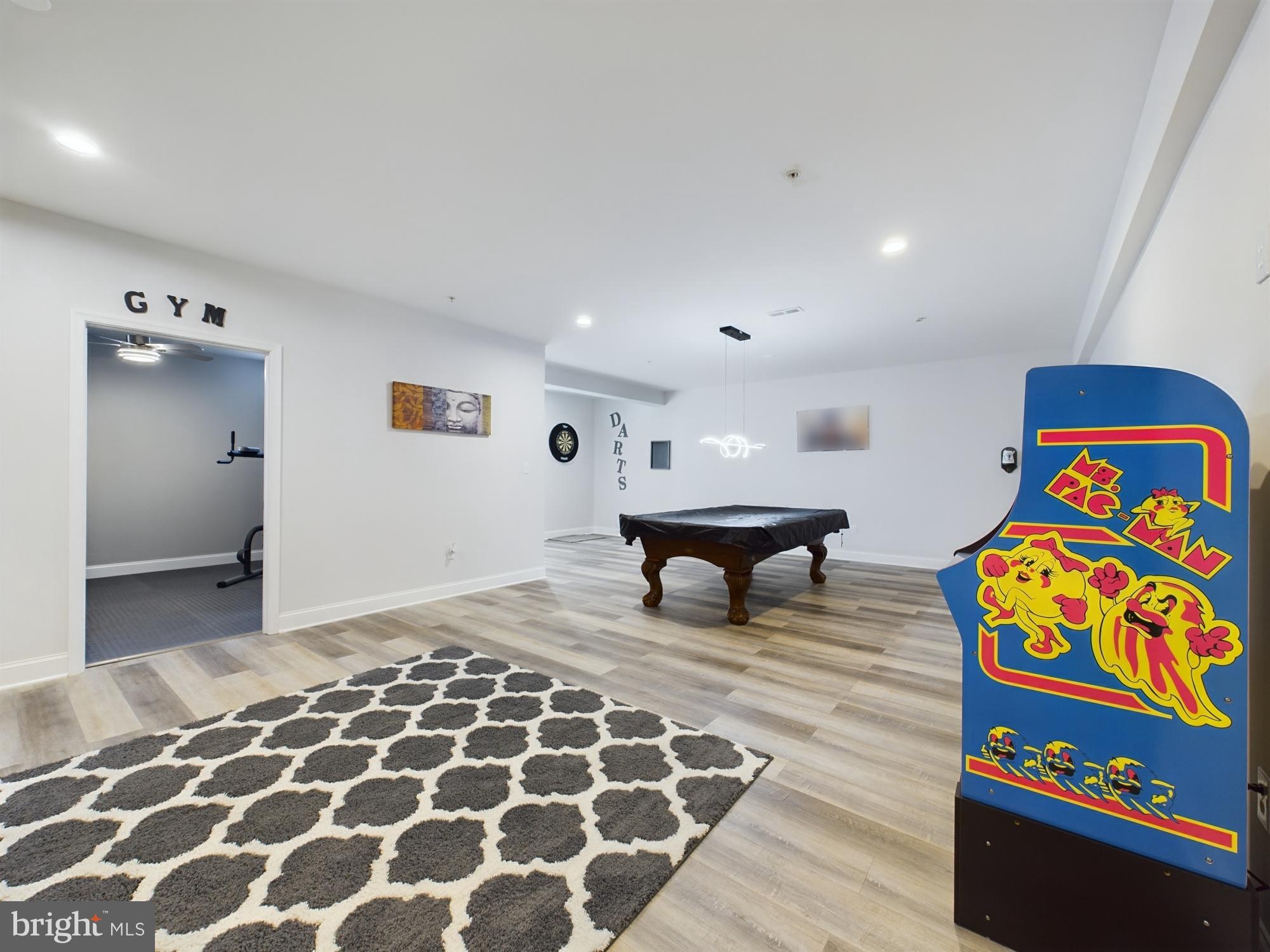 14601 Driftwood Road Bowie, MD 20721 - Photo 57 of 90 Recreation room with vintage arcade charm.