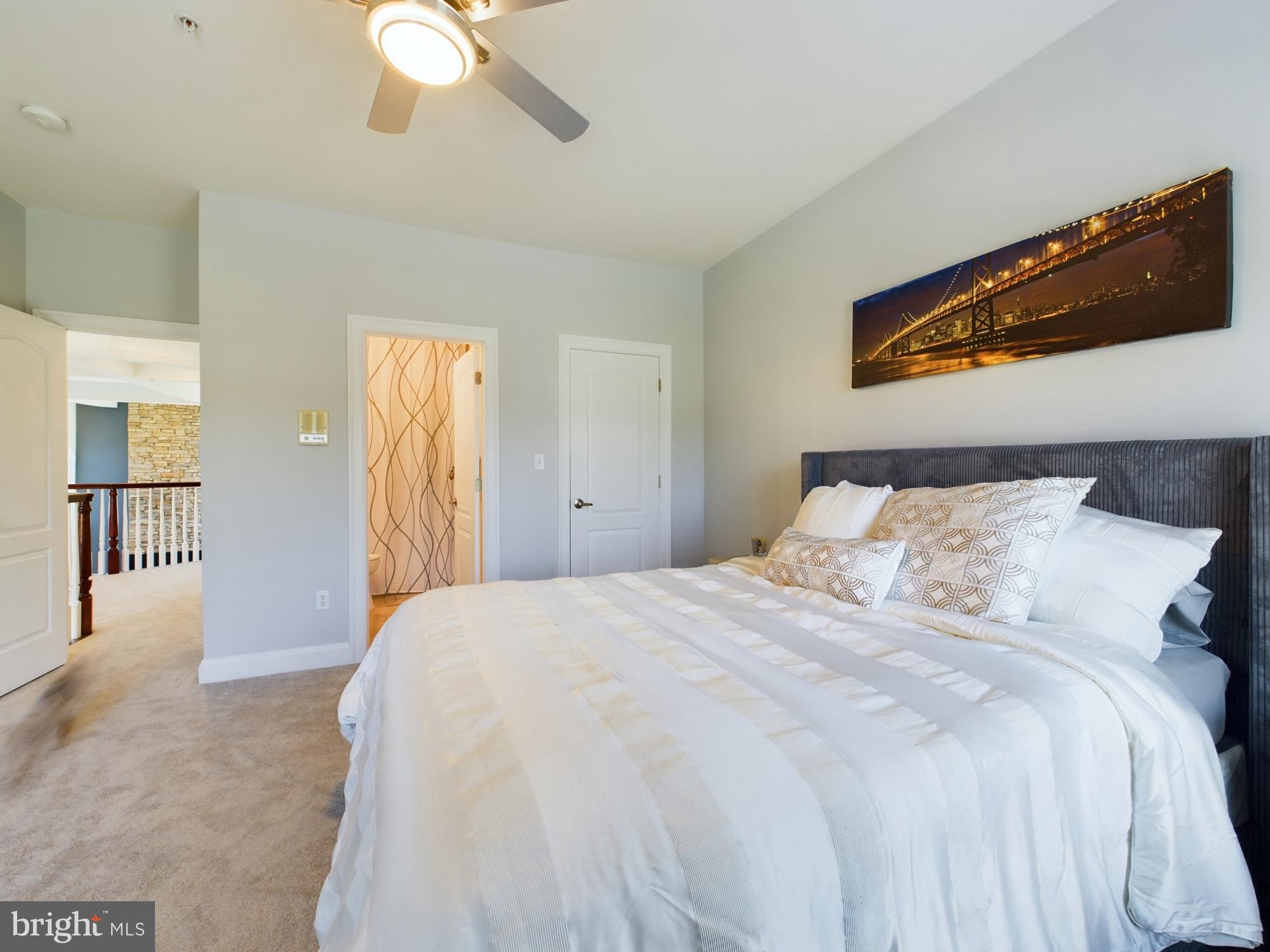 14601 Driftwood Road Bowie, MD 20721 - Photo 66 of 90 Serene bedroom with modern elegance.