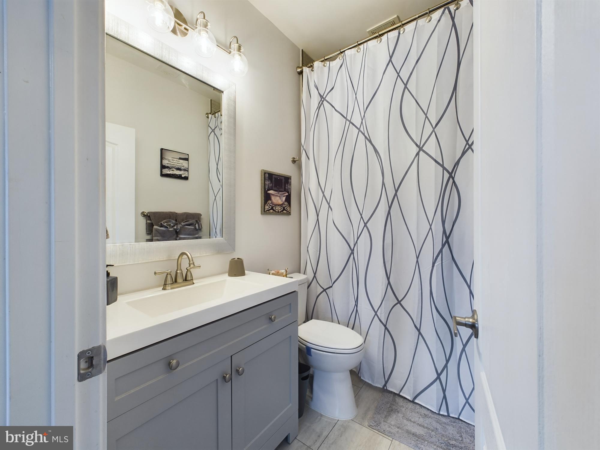 14601 Driftwood Road Bowie, MD 20721 - Photo 67 of 90 Modern bathroom with elegant design elements.