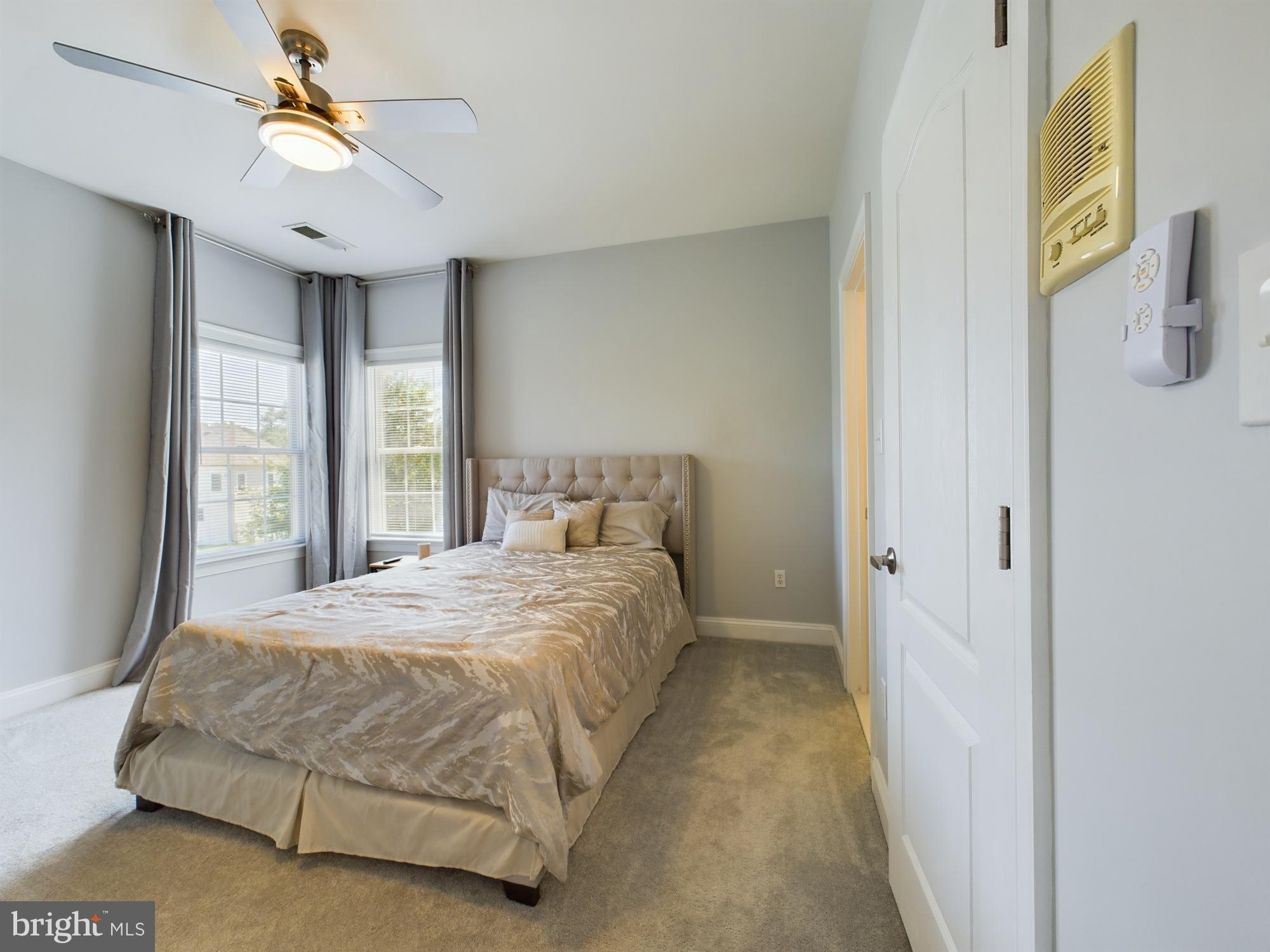 14601 Driftwood Road Bowie, MD 20721 - Photo 69 of 90 Serene bedroom with natural light and elegance.