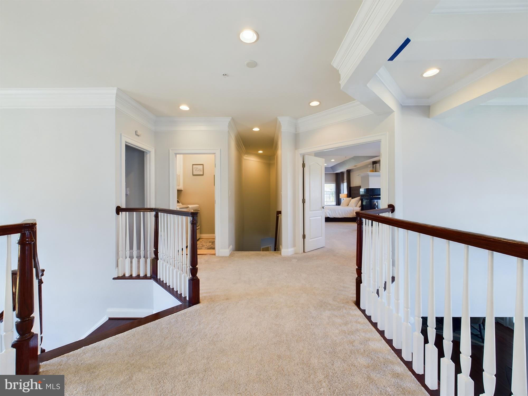 14601 Driftwood Road Bowie, MD 20721 - Photo 72 of 90 Spacious upper hallway with elegant details.