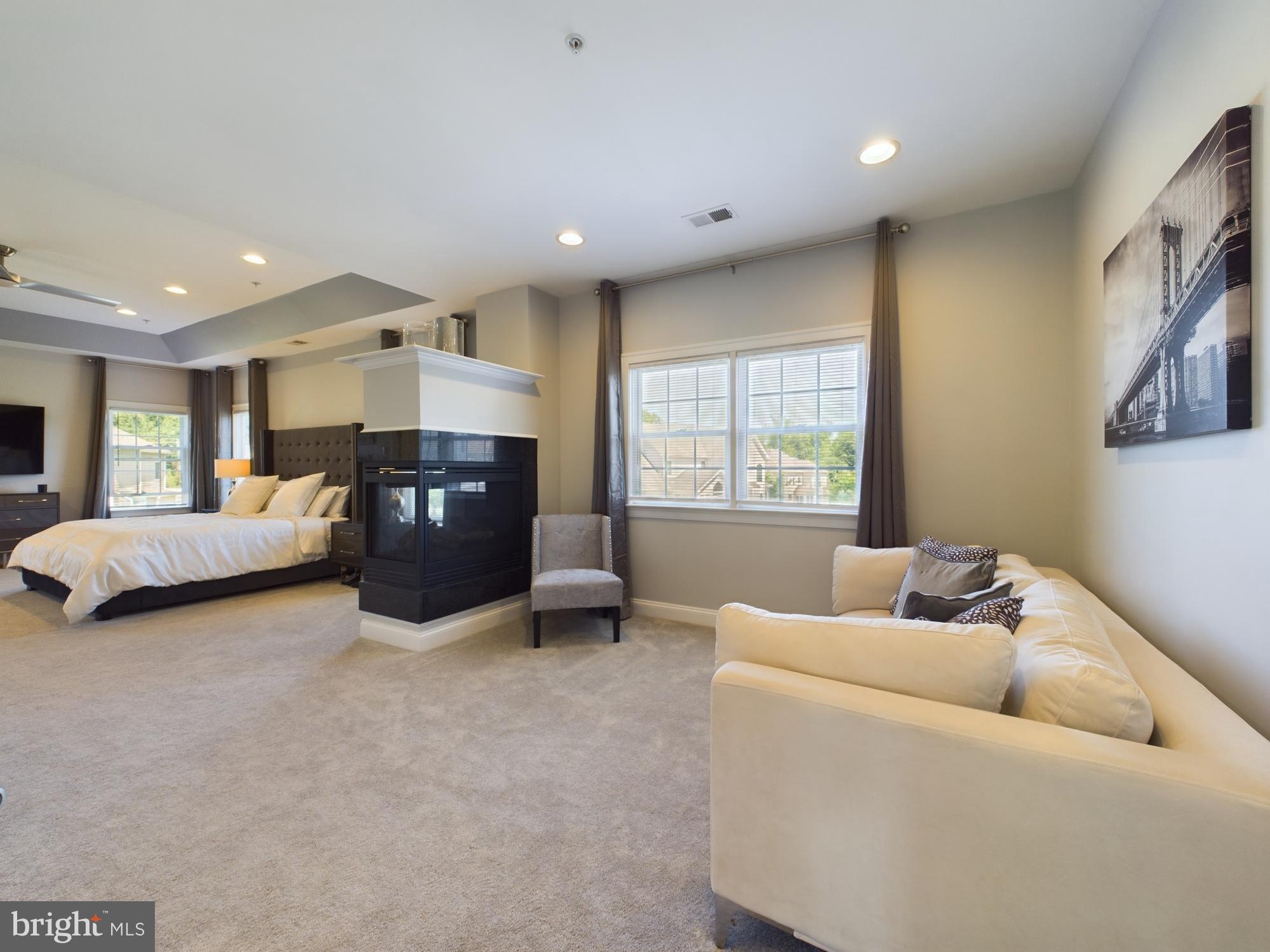 14601 Driftwood Road Bowie, MD 20721 - Photo 79 of 90 Spacious bedroom with modern elegance.