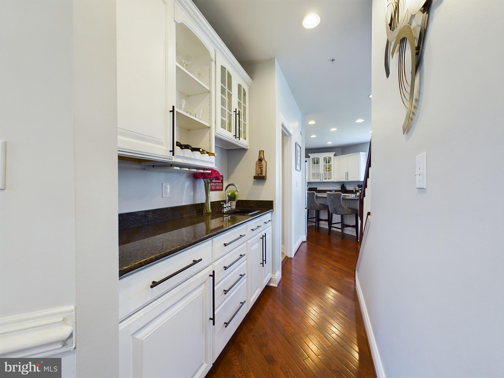 14601 Driftwood Road Bowie, MD 20721 - Photo 8 of 90 Sleek kitchen corridor with elegant finishes.