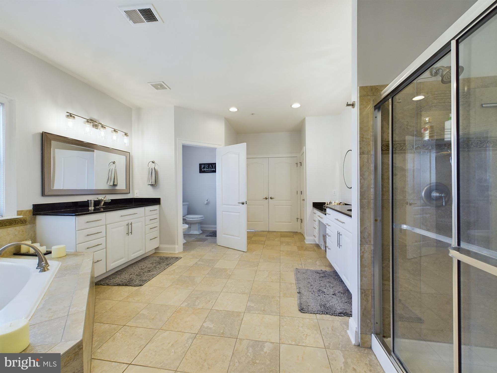 14601 Driftwood Road Bowie, MD 20721 - Photo 86 of 90 Spacious, modern bathroom with elegant finishes.