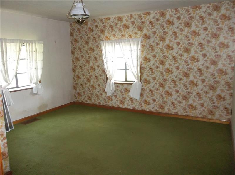 113 Grange Road Rochester, PA 15074 - Photo 5 of 11 A dining room on the first floor could serve as a bedroom.