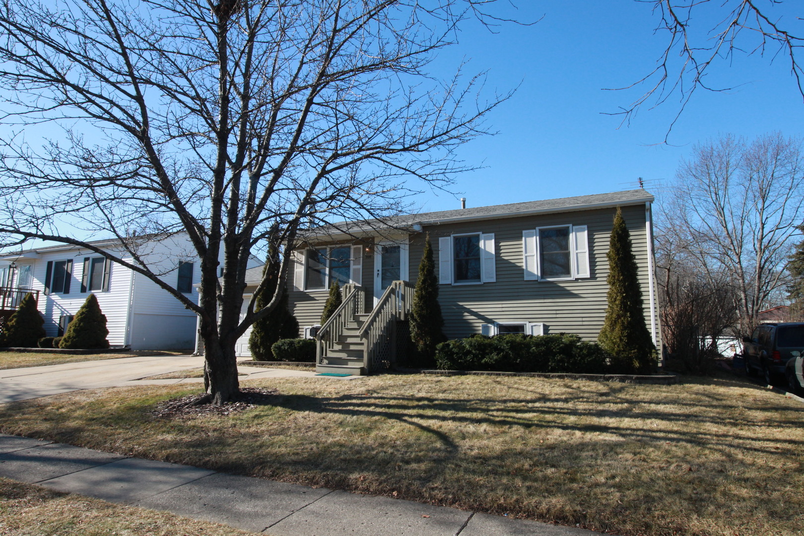 308 South Oltendorf Road Streamwood, IL 60107 - Photo 1 of 1 a front view of a house with a yard