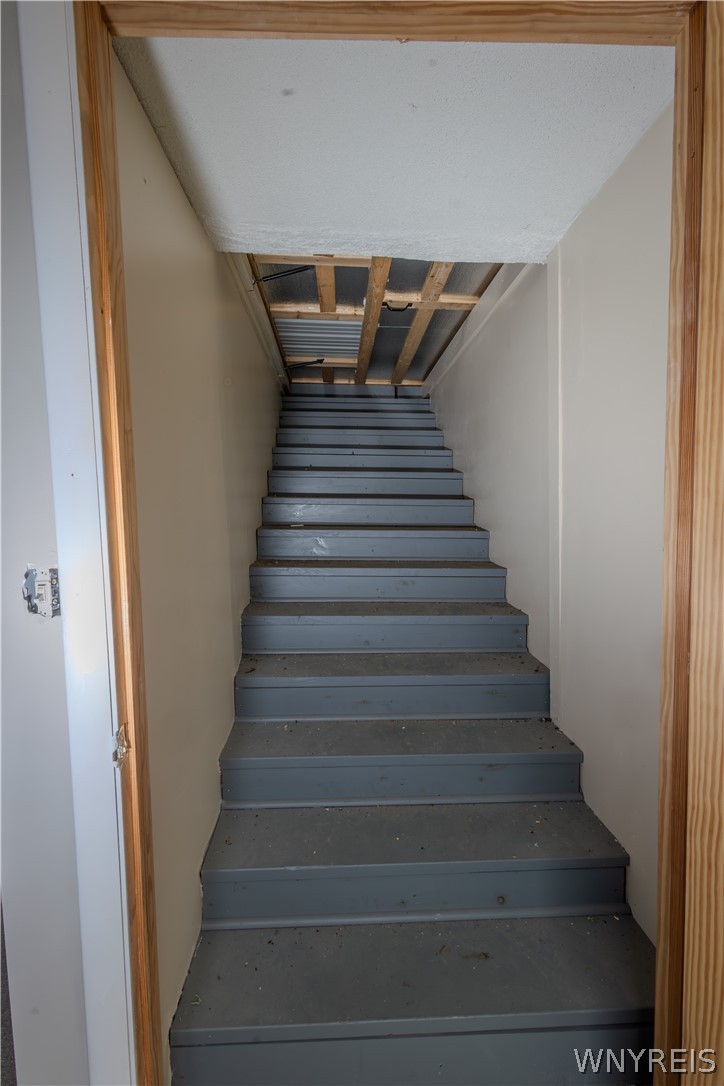 9380 Warsaw Road Le Roy, NY 14482 - Photo 26 of 32 staircase to attic