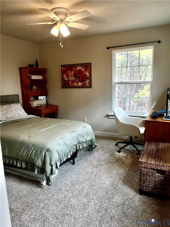2267 Carys Creek Rd Fork Union Fork Union, VA 23055 - Photo 22 of 25 a spacious bedroom with a bed and a window
