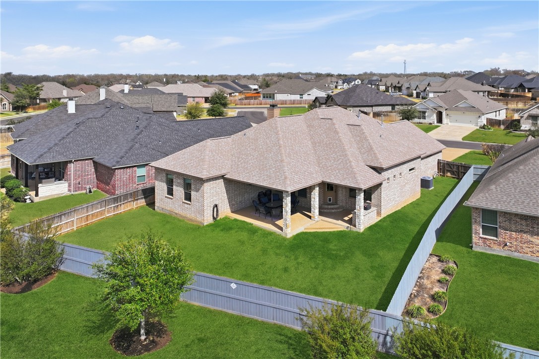 3516 Foxcroft Path Bryan, TX 77808 - Photo 34 of 38 an aerial view of residential houses with yard and ocean view