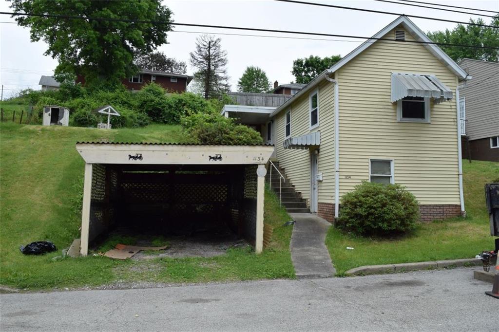 1134 Rostraver Street Monessen, PA 15062 - Photo 18 of 18 Front and carport