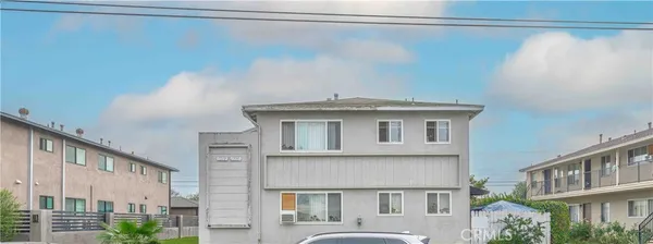 a front view of a house with a garage