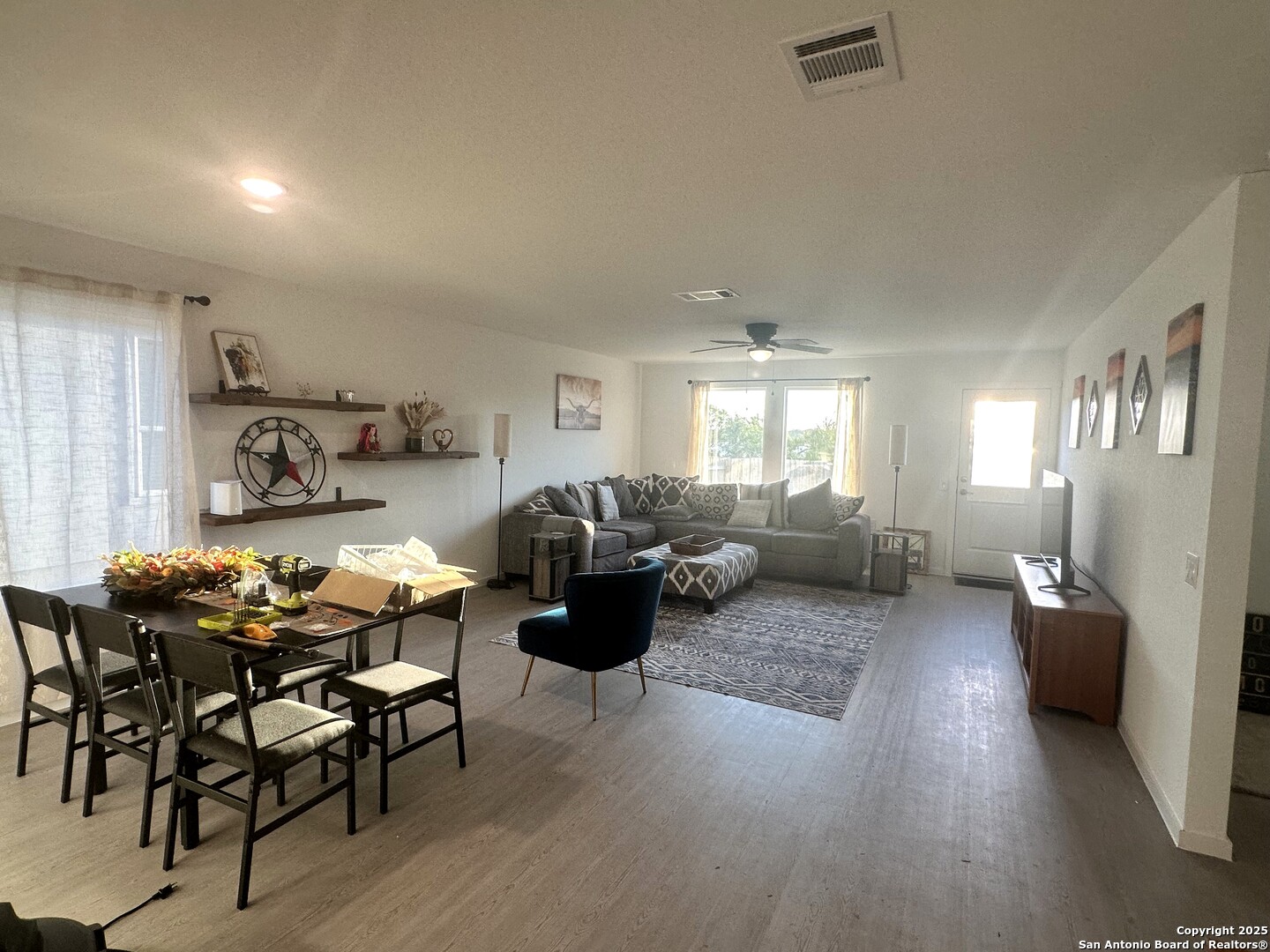 515 Lew Pass San Antonio, TX 78221 - Photo 12 of 26 a living room with furniture and wooden floor
