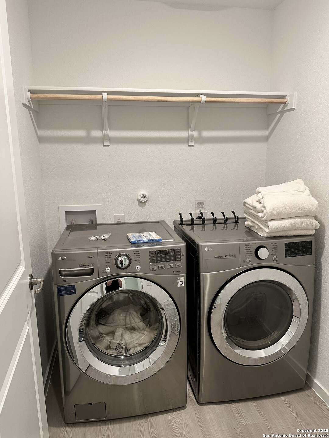 515 Lew Pass San Antonio, TX 78221 - Photo 23 of 26 a utility room with dryer and washer