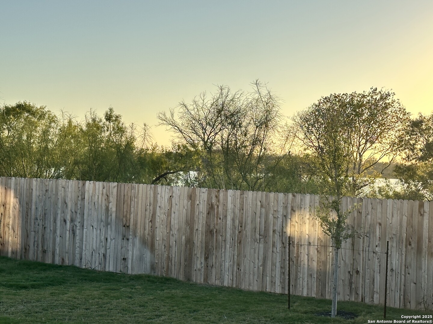 515 Lew Pass San Antonio, TX 78221 - Photo 25 of 26 a view of a backyard with wooden fence