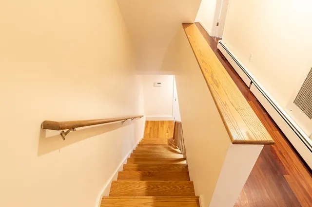 a view of balcony with wooden floor