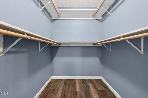a view of a room with racks on the wall