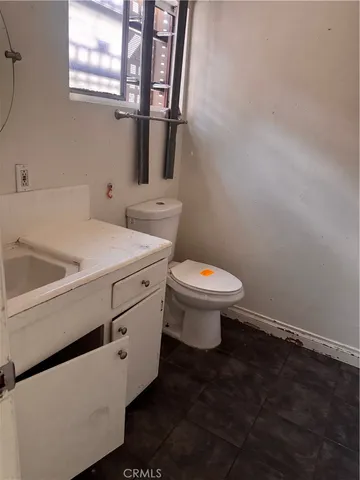 a bathroom with a sink and a toilet