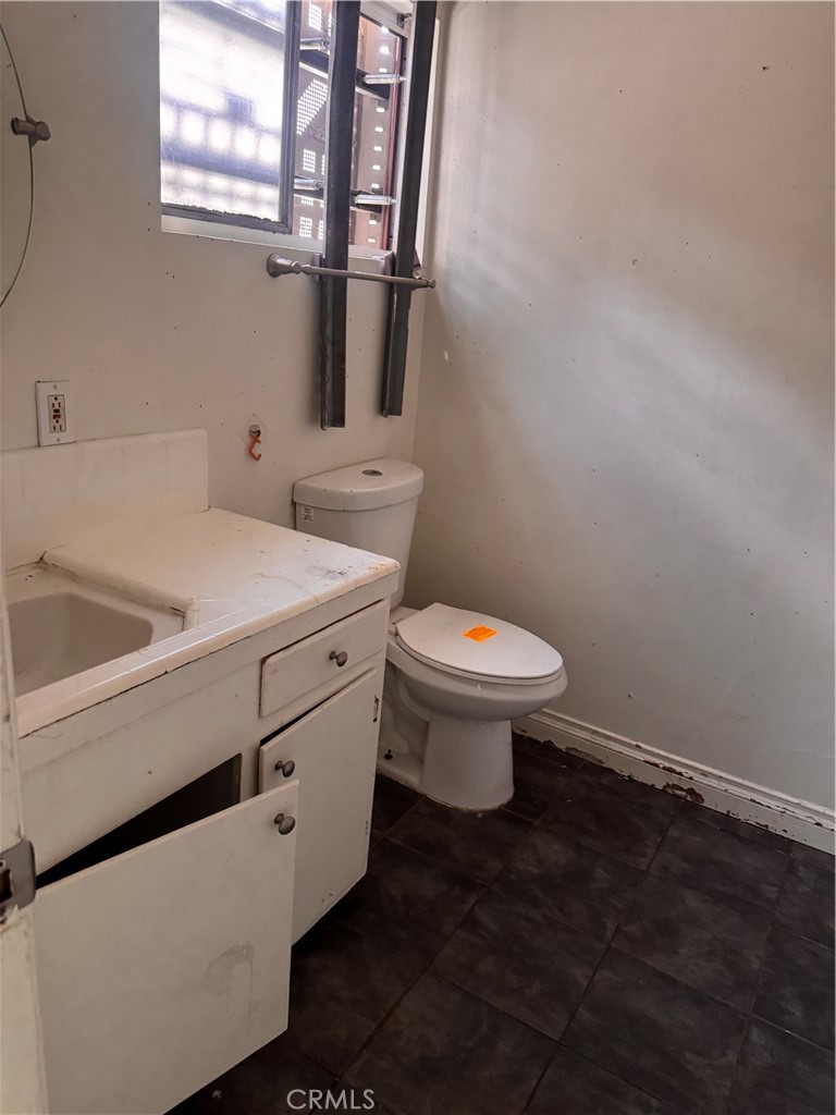 925 East Appleton Street, Unit 4 Long Beach, CA 90802 - Photo 9 of 9 a bathroom with a sink and a toilet