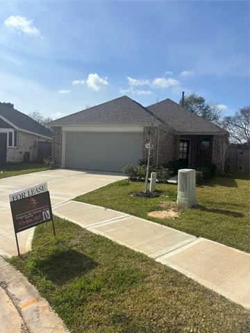 a view of a patio with a yard
