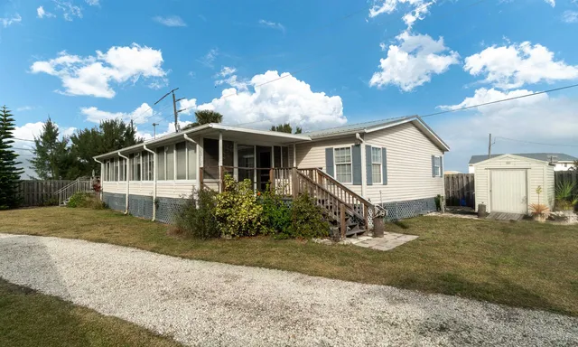a view of a wooden fence