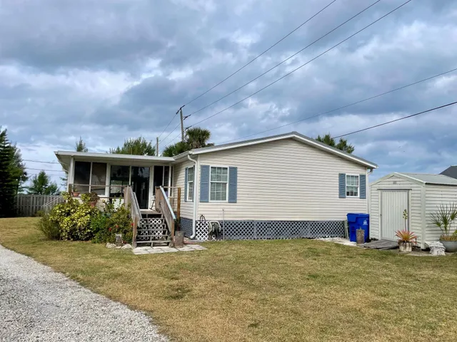 a house view with a garden space