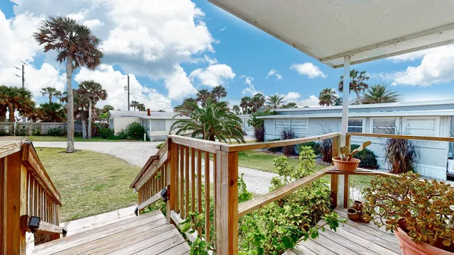 a view of a backyard with garden