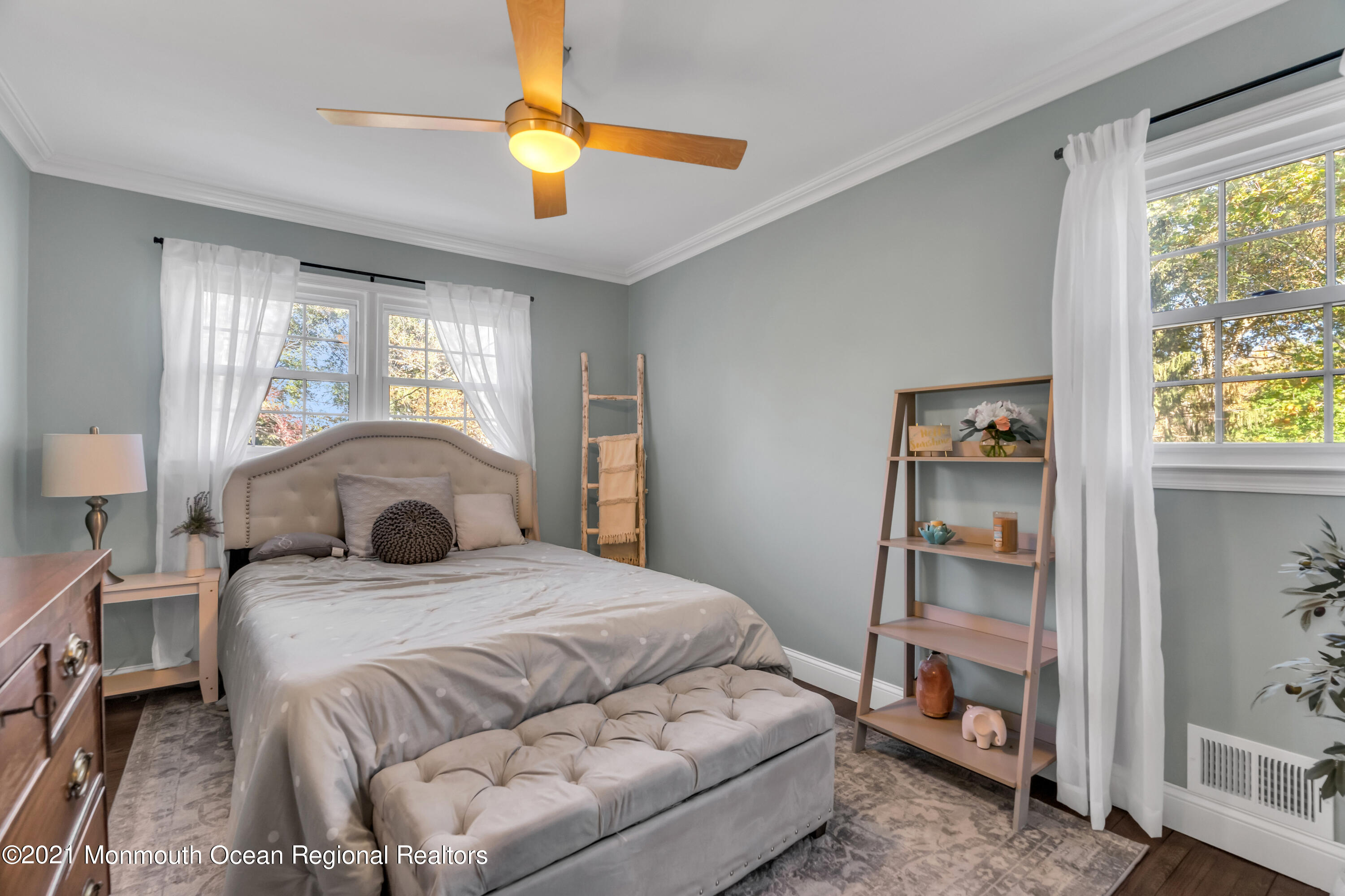 6 Spring Valley Drive Holmdel, NJ 07733 - Photo 18 of 32 a bedroom with a bed and a window
