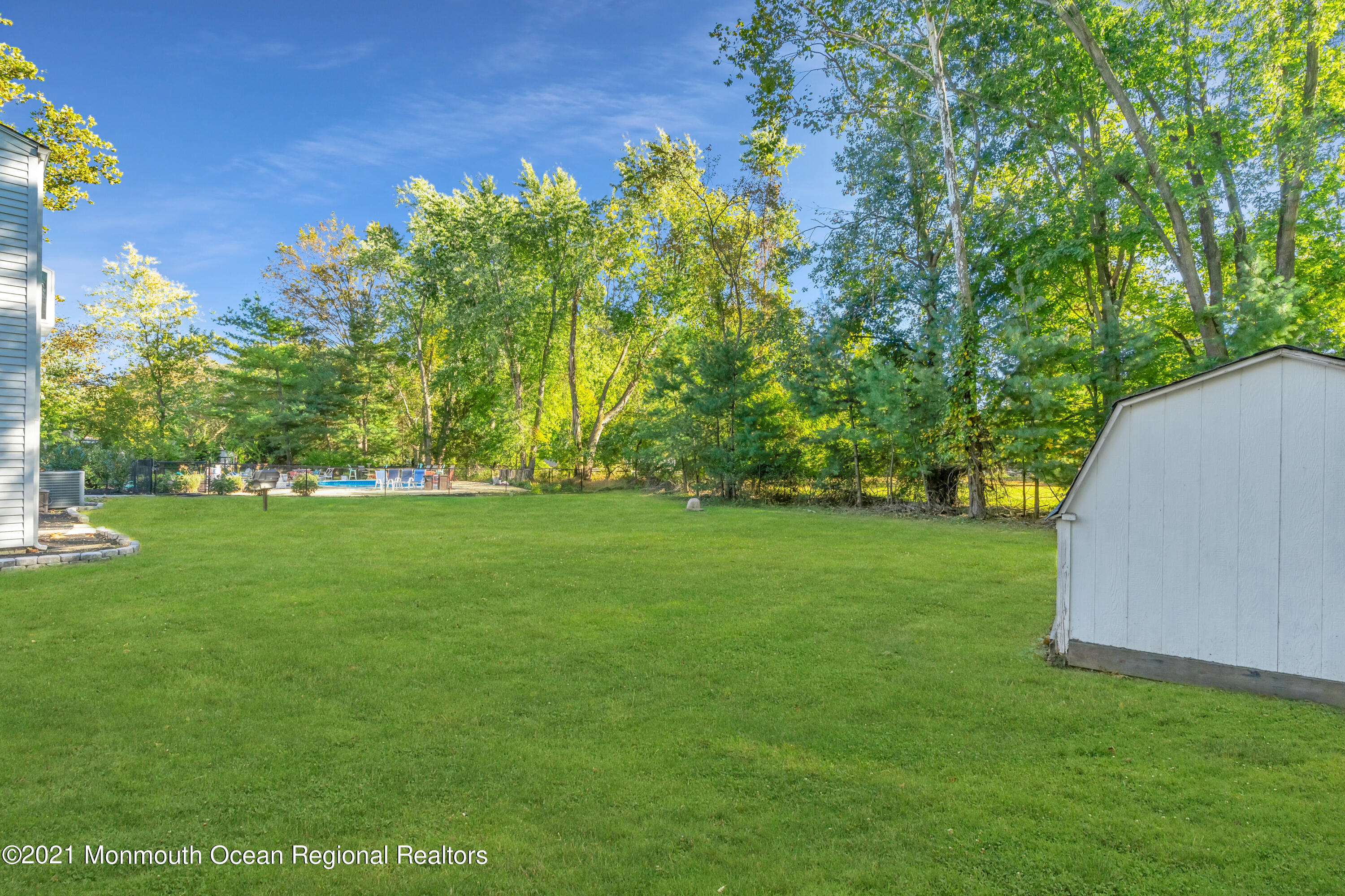 6 Spring Valley Drive Holmdel, NJ 07733 - Photo 25 of 32 a view of yard with green space