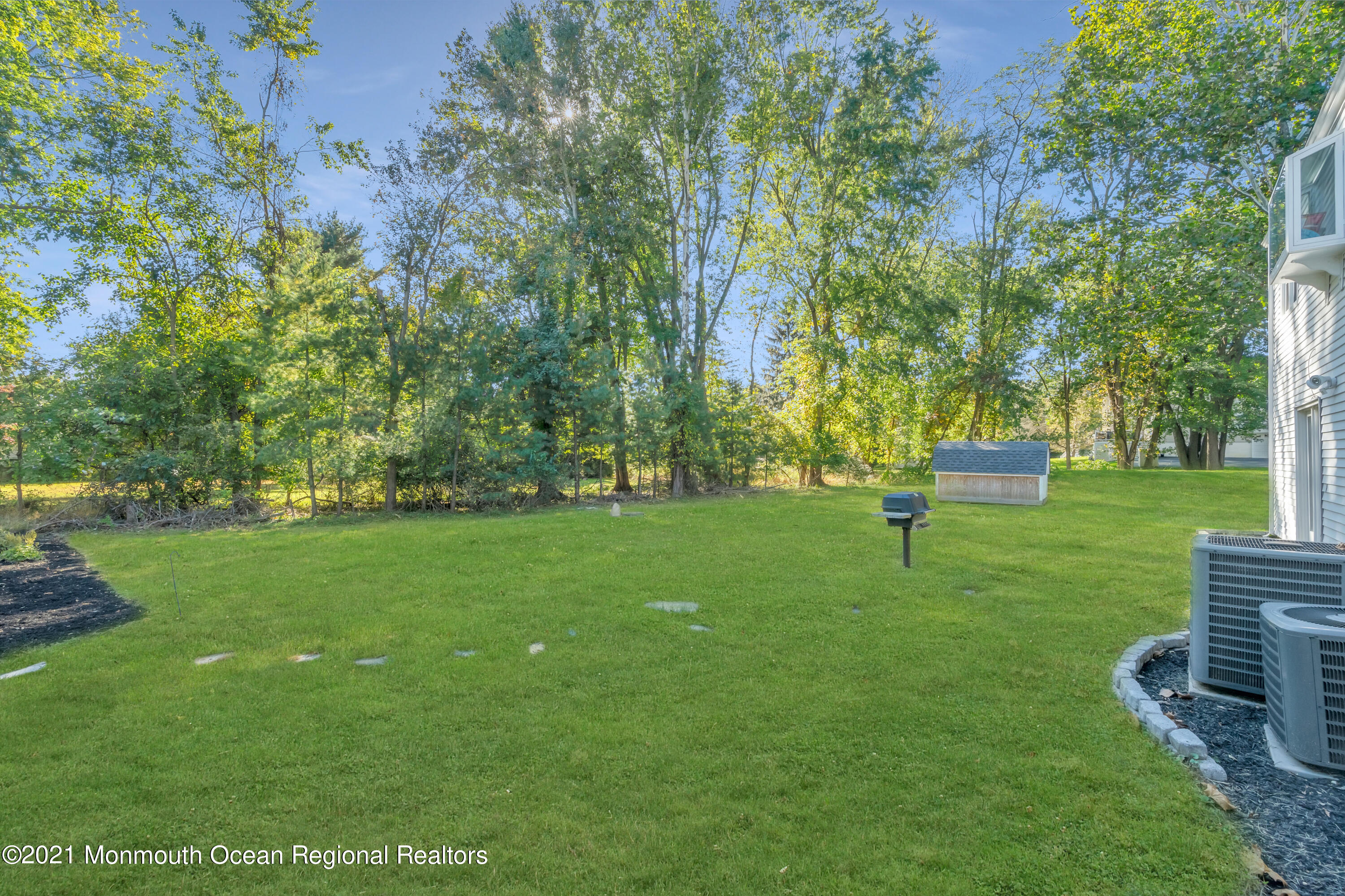 6 Spring Valley Drive Holmdel, NJ 07733 - Photo 26 of 32 a view of a park with trees