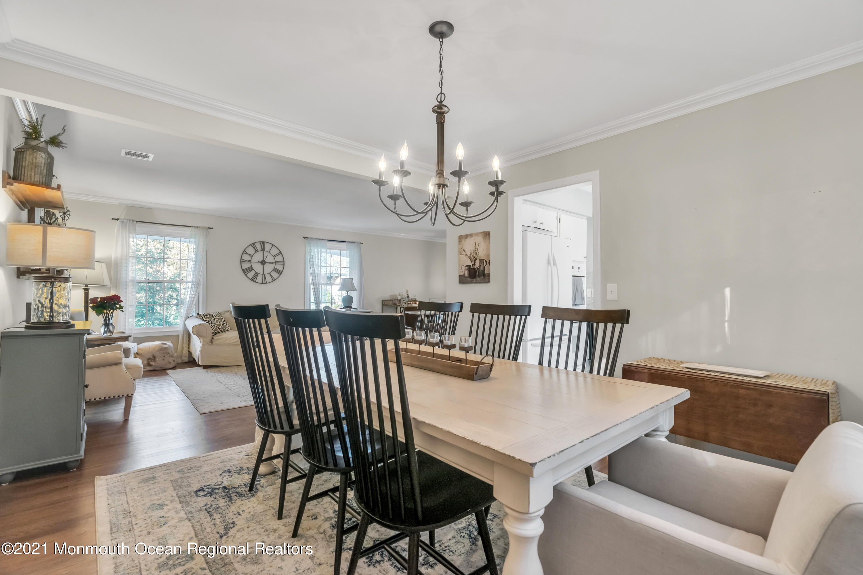 6 Spring Valley Drive Holmdel, NJ 07733 - Photo 9 of 32 a view of a dining room with furniture and wooden floor