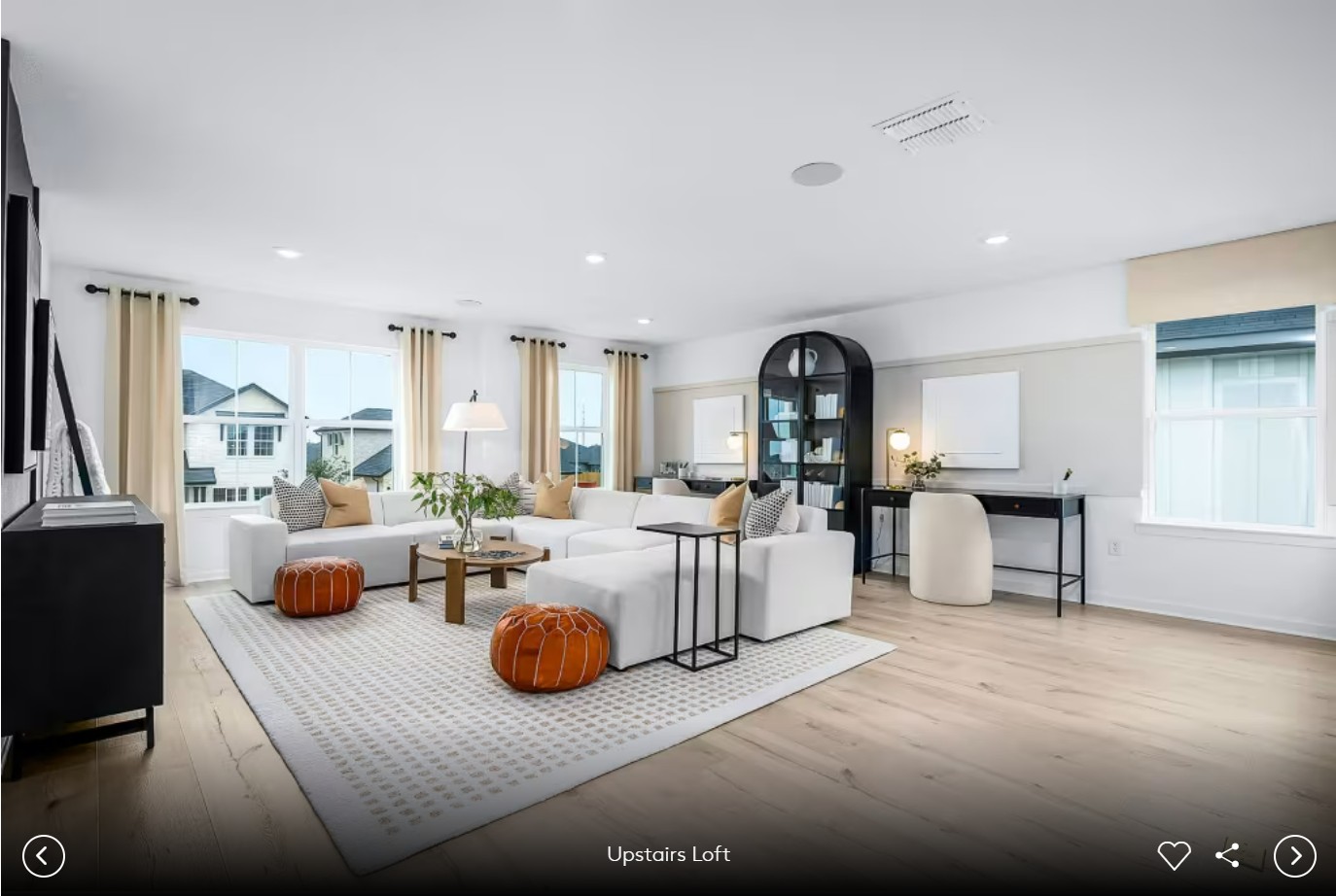624 Rubber Tree Way Buda, TX 78610 - Photo 11 of 12 a living room with furniture and a large window