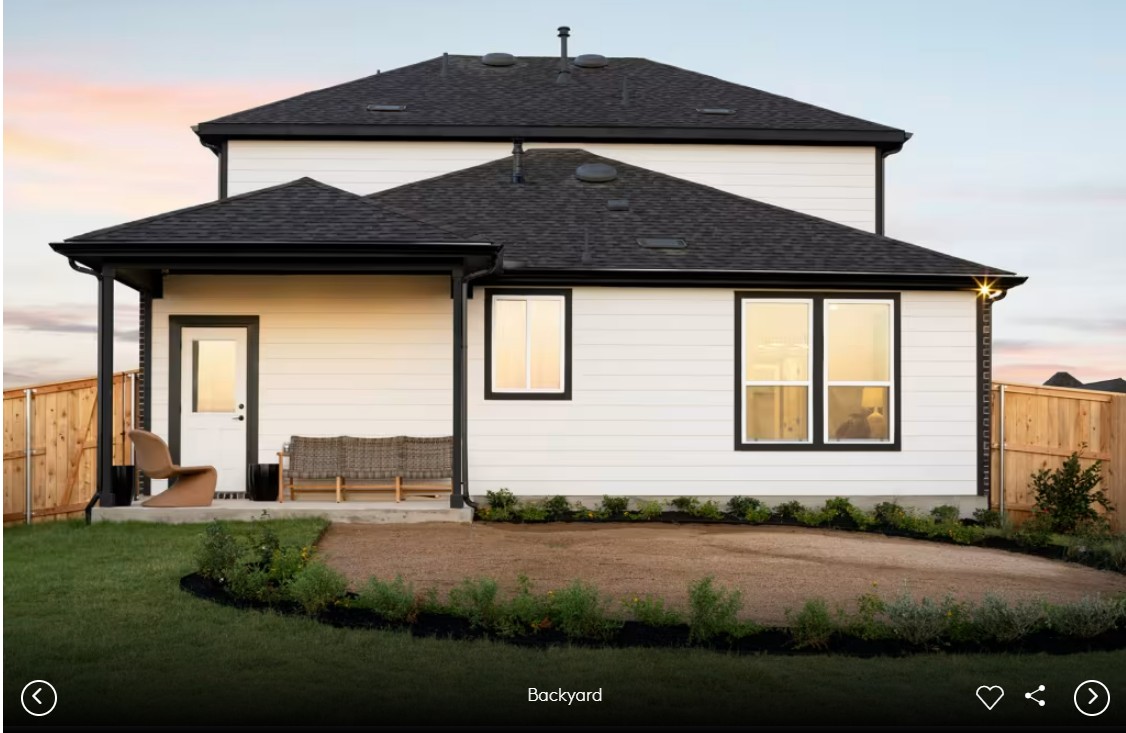 624 Rubber Tree Way Buda, TX 78610 - Photo 12 of 12 a front view of a house with a yard