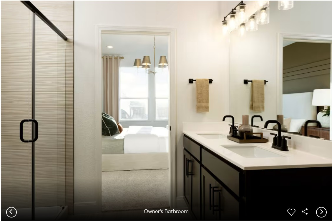 624 Rubber Tree Way Buda, TX 78610 - Photo 6 of 12 a bathroom with a sink vanity granite tub shower and a mirror