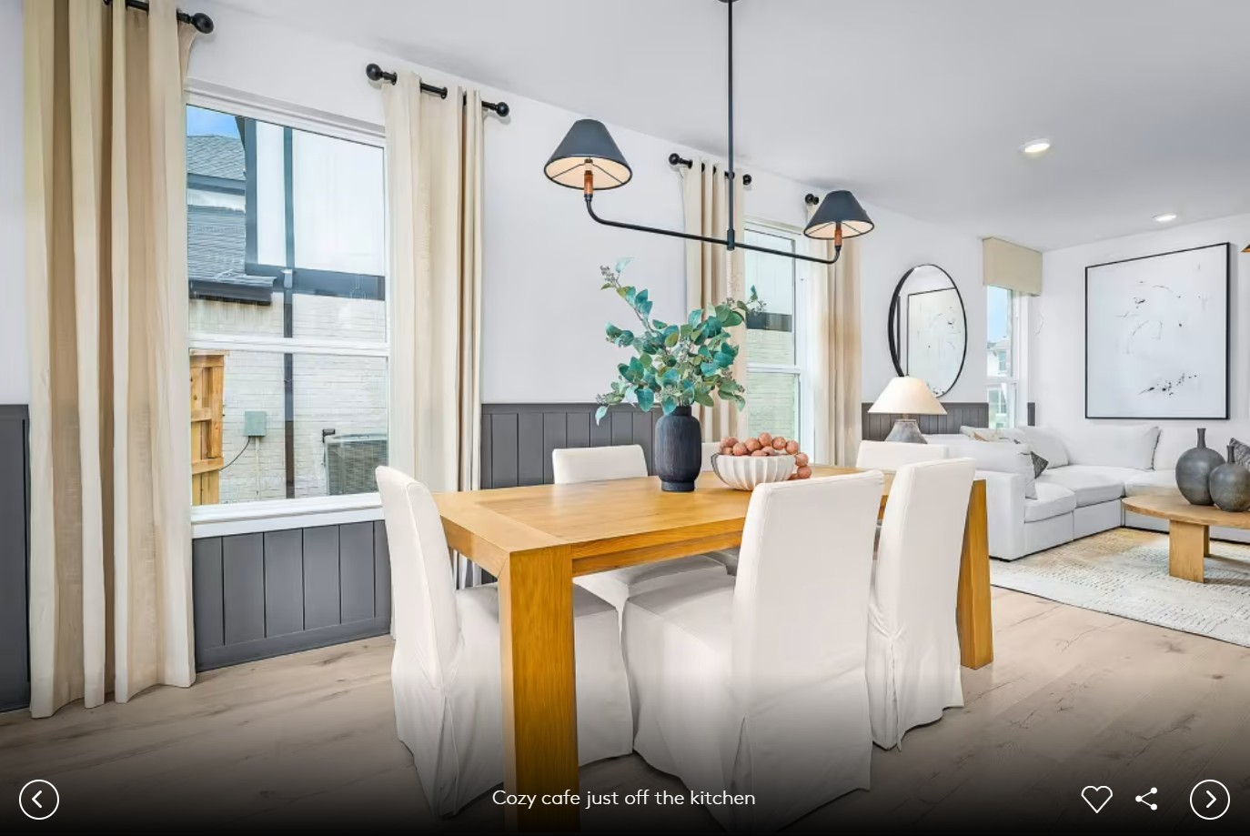 624 Rubber Tree Way Buda, TX 78610 - Photo 8 of 12 a dining room with furniture and a chandelier
