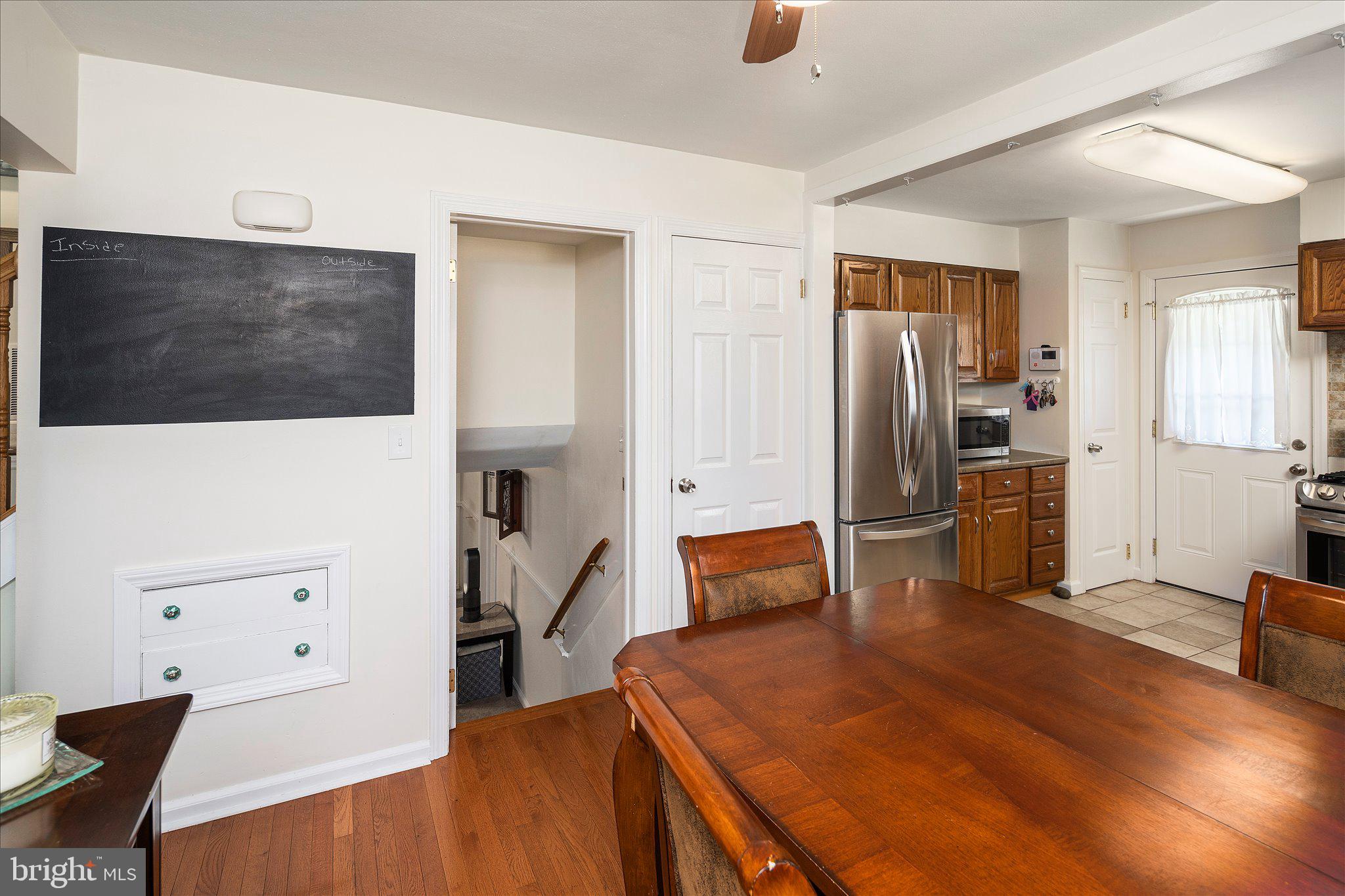 3 Heights Terrace Hamilton, NJ 08620 - Photo 8 of 30 a kitchen with stainless steel appliances kitchen island granite countertop a refrigerator a stove and a sink with wooden floor