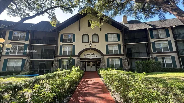 a view of a hallway with a large window