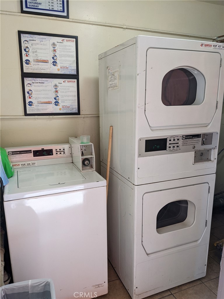 1708 Pine Avenue, Unit 11 Long Beach, CA 90813 - Photo 14 of 17 a utility room with dryer and washer